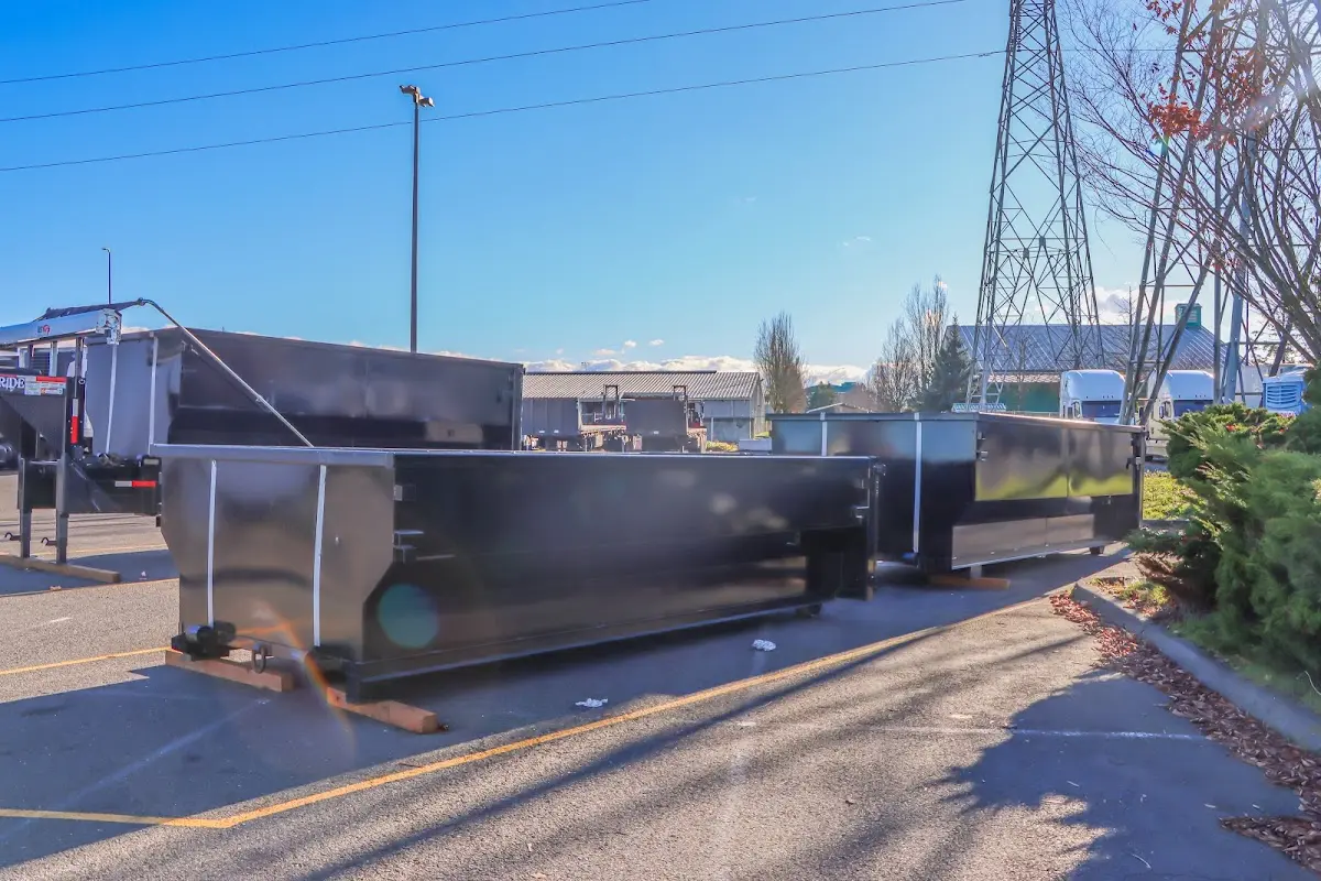 Roll-off dumpster ready for waste disposal at job site for Commercial Dumpster Rental in Flushing